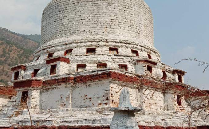 White washing of Chorten (Stupa) 