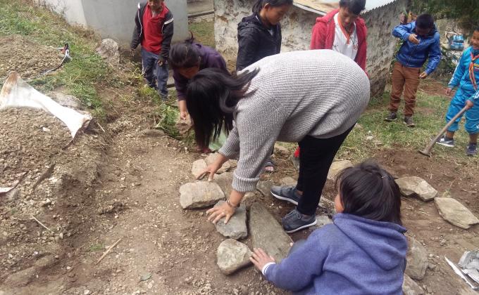 Making steps leading to toilet for special need students.