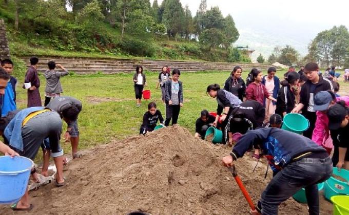 Maintenance of football ground.