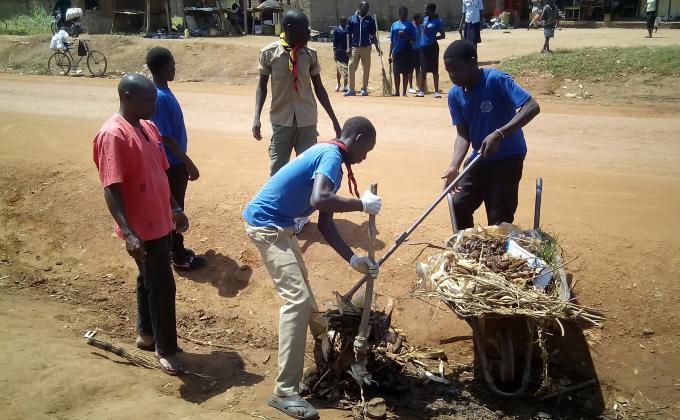 Ascout conserves nature,venture scouts cleanup atrading centre in soroti town (uganda)
