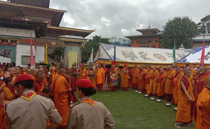 Helping Monk in  Nyerney