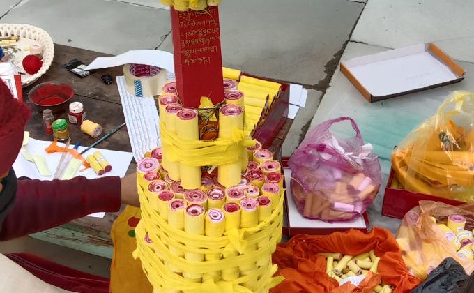 Helping my threoma lopen in making sokshing inorder put inside the chorten