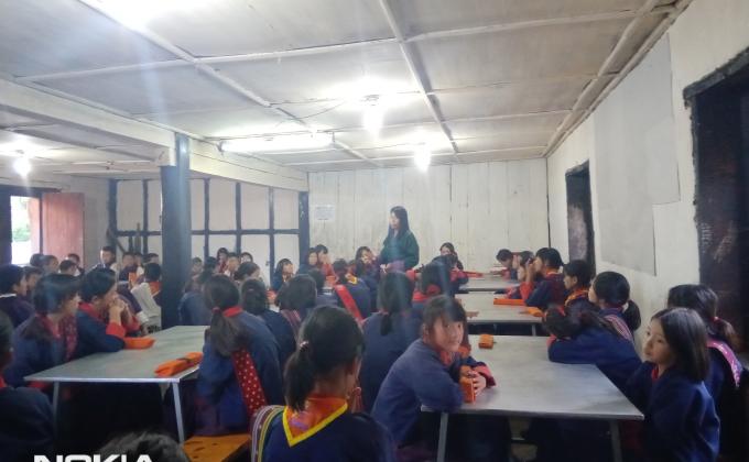 Creating awareness to the children on waste management .