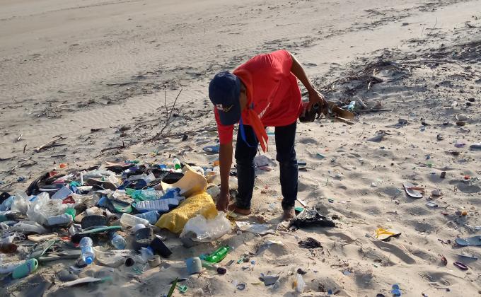 A community service at shela beach cleaning up 