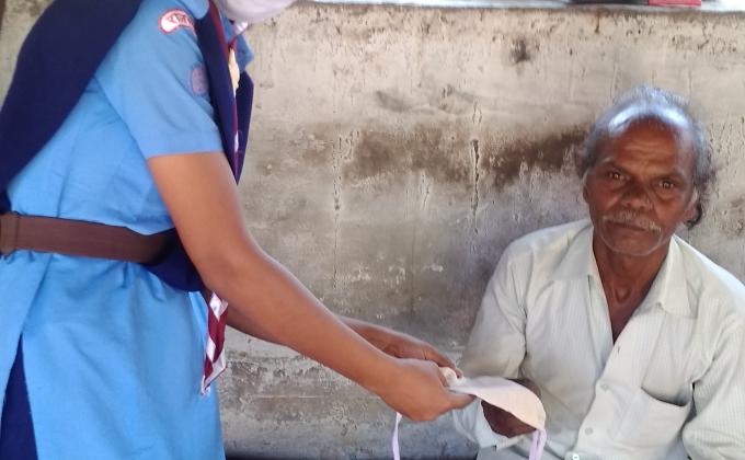 Mask distribution to people for COVID-19.