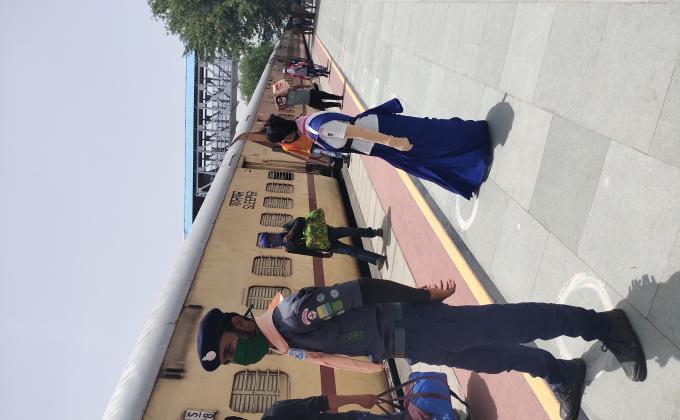 QUEUING PEOPLE AT RAILWAY STATION
