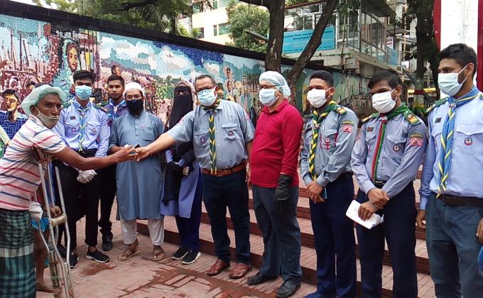 Distributing Mask, Soap & Hand Sanitizer to the Poor People.