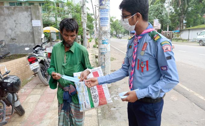 মাস্ক বিতরন ও সচেতনতা ক্যাম্পিং। 