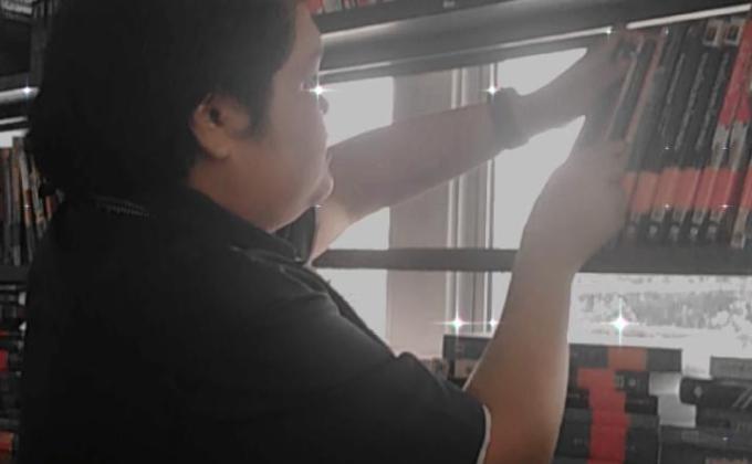 จัดหนังสือในห้องสมุด