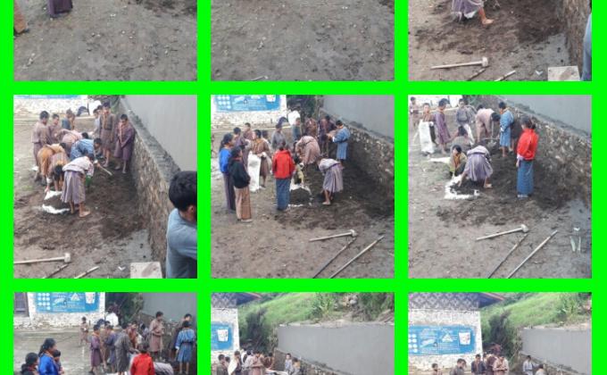 helps in constructing the wall beside assembly ground by senior cubs