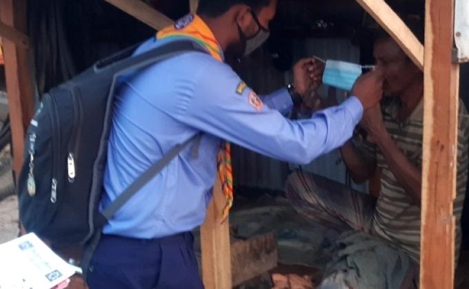 করোনা সর্তকতায় মাস্ক বিতরণ 