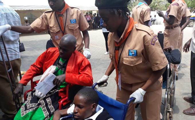 university of Nairobi  rover scouts giving service at a medical camp for the physically challenged