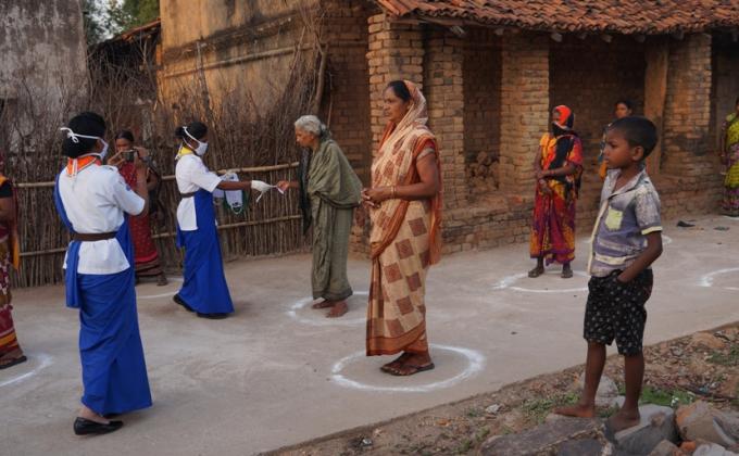 Creating awareness and masks distribution at Kharla village