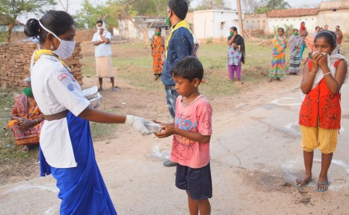 Food distribution at Panderpali village of Bargaon Block, Sundargarh