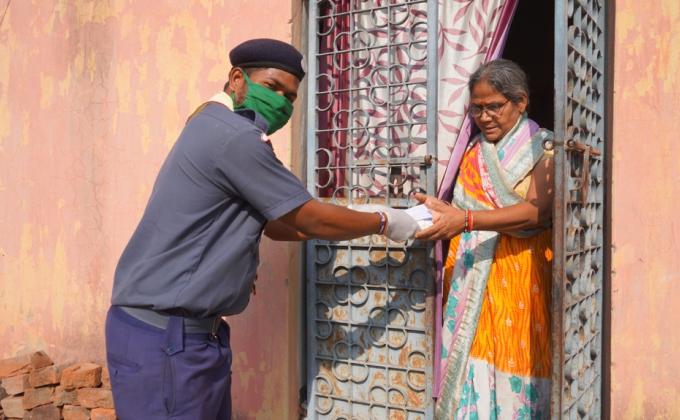 Milk packets distribution at Bandhdhipa village of Bargaon Block