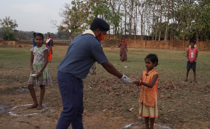 Cooked food packets distribution at Petfod village of Bargaon Block