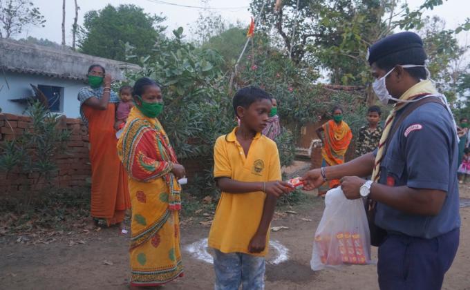 Snacks, biscuits distribution at Gourpada of Bargaon village