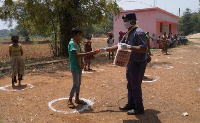 Snacks, biscuits distribution at Kisanpada of Kutra village, Block-Kutra