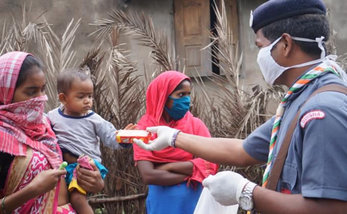 Snacks, biscuits distribution at Padajampali village of Rajgangpur Block