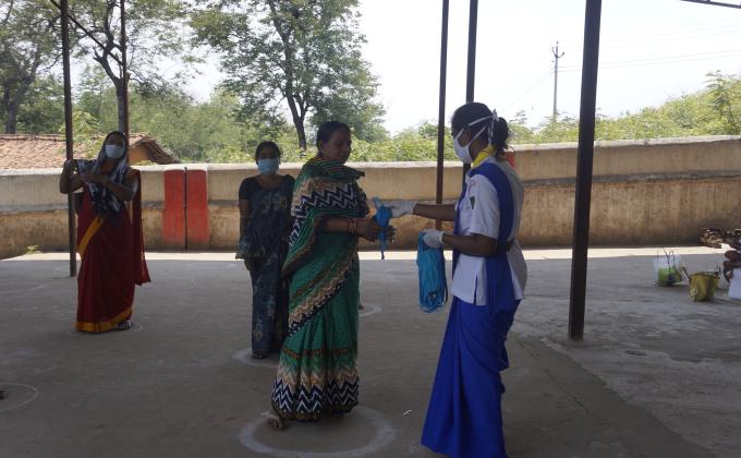 Mask distribution at Tangarpali village