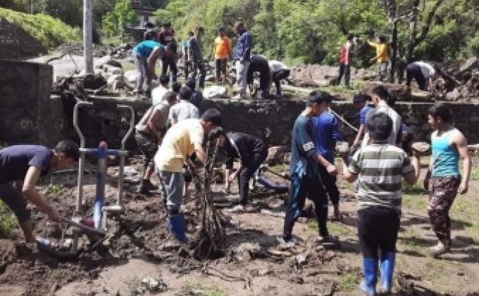 cleaning beside ECCD at lhuntse.