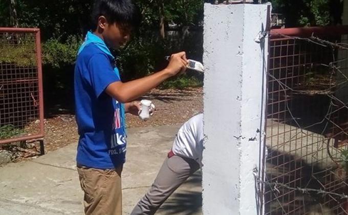 Scouts cleaning around the BSP Council