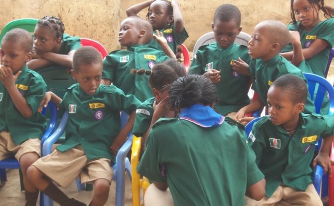 NIGERIA YOUNG SCOUTS PAY COURTESY MESSENGERS OF PEACE VISIT TO THEIR SCHOOL PRINCIPAL DURING A WEEK LONG HOLIDAY CAMPING.