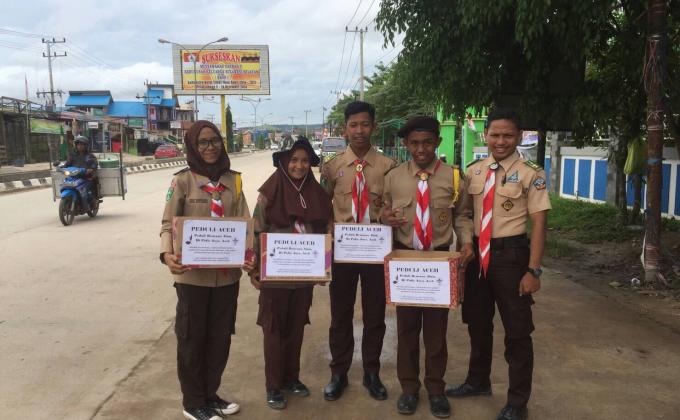 Pramuka Sangatta Utara & Selatan Peduli Gempa Aceh