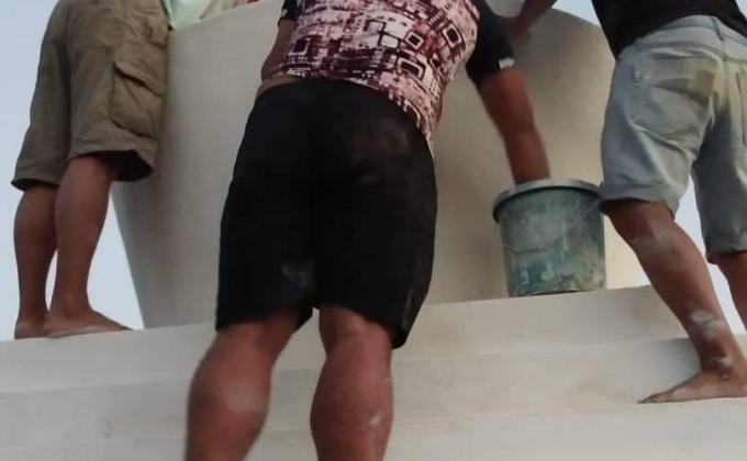 Brightening the golden stupa