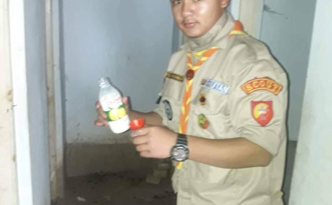 Scouts ensuring clean and safe public toilets during mass.relugious diacourse in Bhutan
