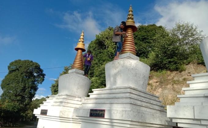 White washing chorten( stupas) 