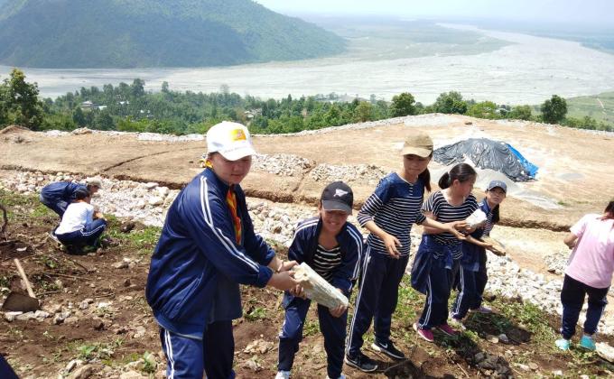Helping hand towards construction of chorten(Stupa)