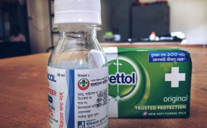 Distributing Dettol Soap & Alcohol Based Hand-sanitizer to the Scouts.