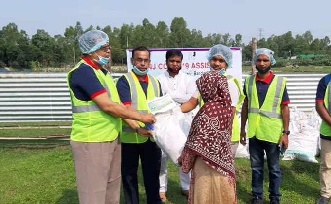 Eid items were distributed among the helpless and poor people.


